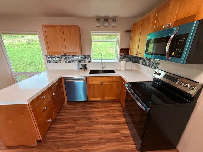 Building Photo - Upper Kalaheo, fully renovated three-bedroom two bathroom home.