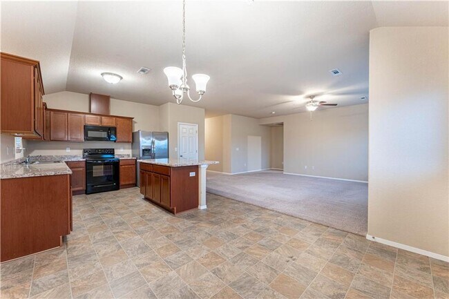 Building Photo - Focus on a different feature, like being pet-friendly or having appliances included