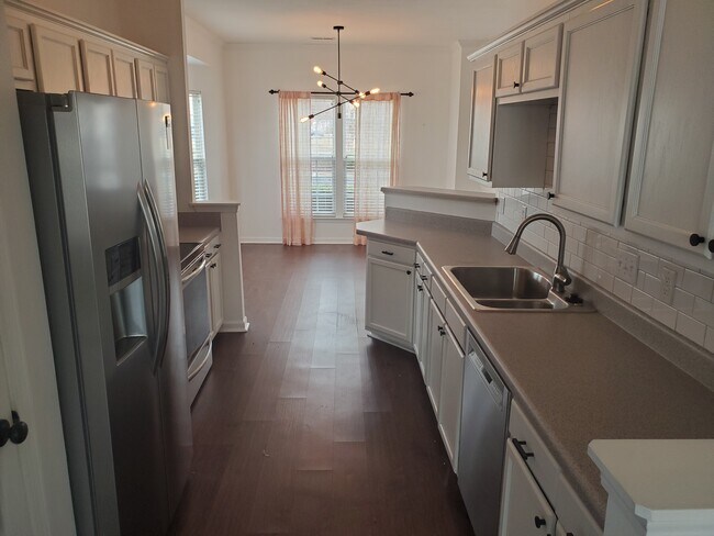 Looking through galley kitchen from living room. - 42 Gr-Pd-51