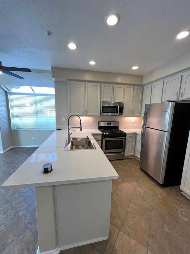 Building Photo - PICTURE PERFECT!  3 BR/3 BA END UNIT CONDO with DIRECT ACCESS 2 CAR GARAGE