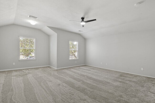 Building Photo - Stunning Corner Unit Townhome - Move-in special: Receive $100 off both your first and second mont...