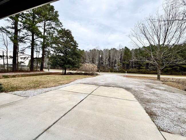 Building Photo - Farmhouse-style Home - Ready NOW in Pungo! A First Time Rental with a HUGE Fenced Yard, Attached ...