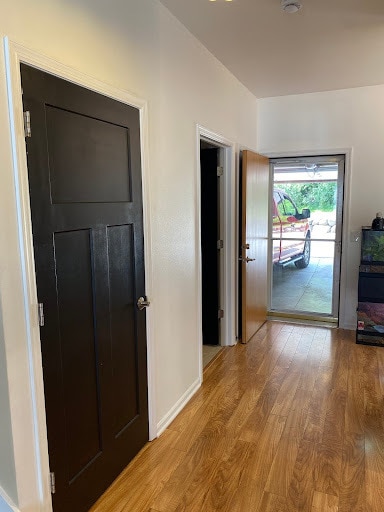 Left door is the basement showing easy access to garage. - 9 Daytona Beach Dr