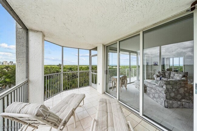 Building Photo - 6361 Pelican Bay Blvd