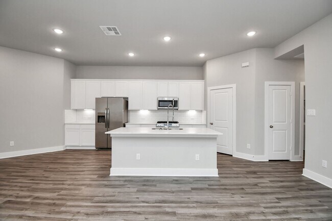 Building Photo - Welcome to the Elm — Single-Level Charm, Modern Style.