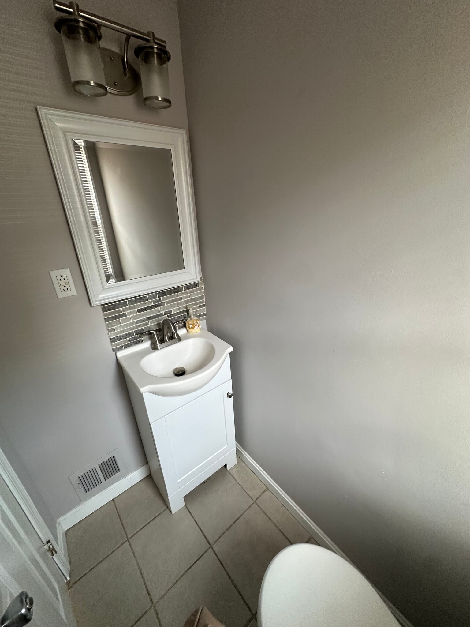 Half Bath Near Entry Way - 5422 67th Ave
