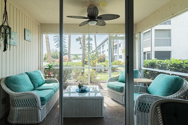 Building Photo - AVAILABLE NOW! Furnished Ground-Floor End Unit | Lake & Pool Views | Minutes to Marco Island & Do...