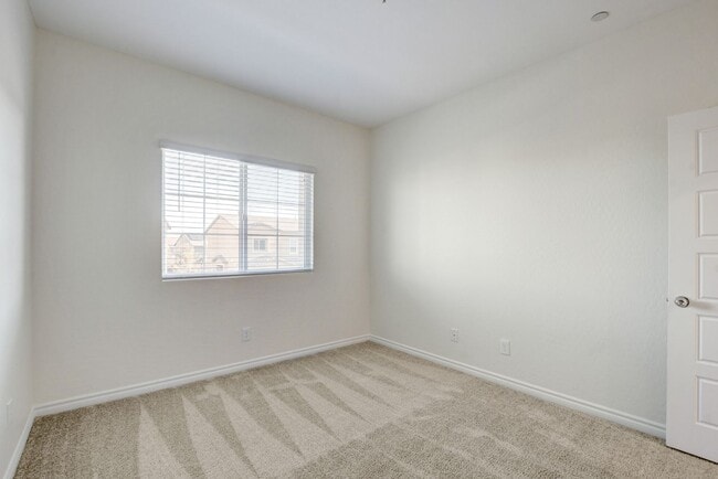 Building Photo - 4 Bedroom Townhouse in Tule Springs Coming Soon!