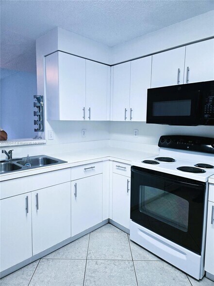 1210 Sorrento Dr 1210 Sorrento - 1210 Sorrento Dr Weston Fl Building Photo 