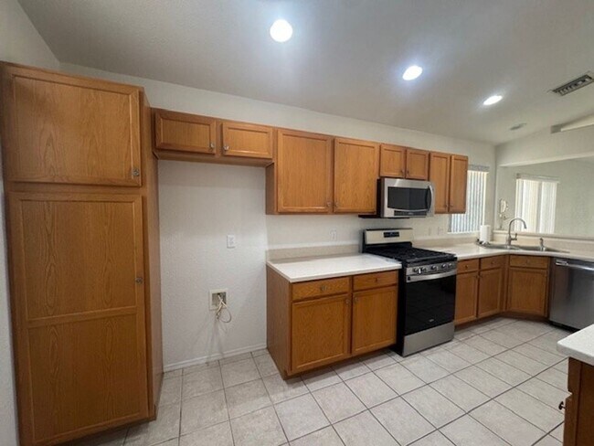 Building Photo - 2BR + 2 BONUS ROOMS with 54 foot Long Boat/Toys DEEP Garage