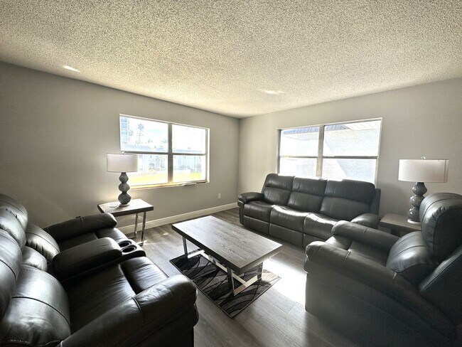 Building Photo - STUNNING 2/2 RIVERFRONT RENTAL IN KEY HARBOR