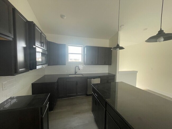 Building Photo - 5103/05 S Chase Ave