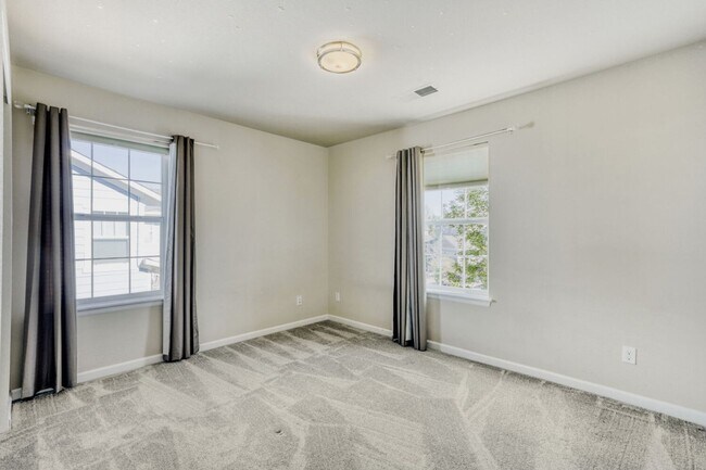 Building Photo - Bright, Seamless Living in Longmont’s Premier School District