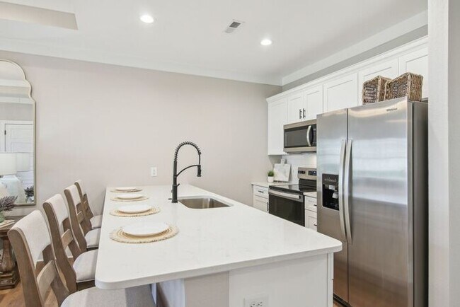 Building Photo - Finally, Space to Breathe — One-Level Homes, Not Crowded Apartments