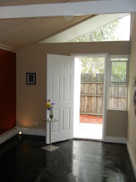 Bedroom that opens to private backyard (bedrooms are identical). - 1400 Julian St