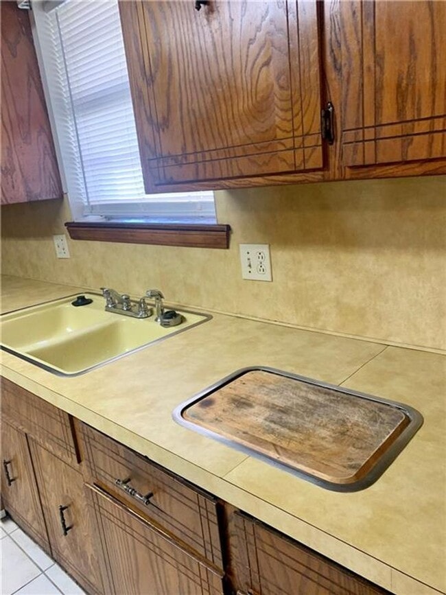 Building Photo - Charming Home with Open Kitchen, Fireplace & 2-Car Garage