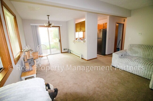 Building Photo - 2 Bed, 1 Bath Lower-Level Unit with Garage Parking and Trail Access