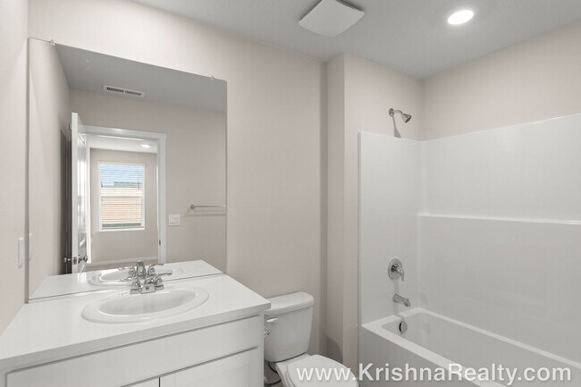 Building Photo - Modern 1-Year-Old NEW CONSTRUCTION 3 BR, 2.5 BA DR Horton Townhome with Community Playground