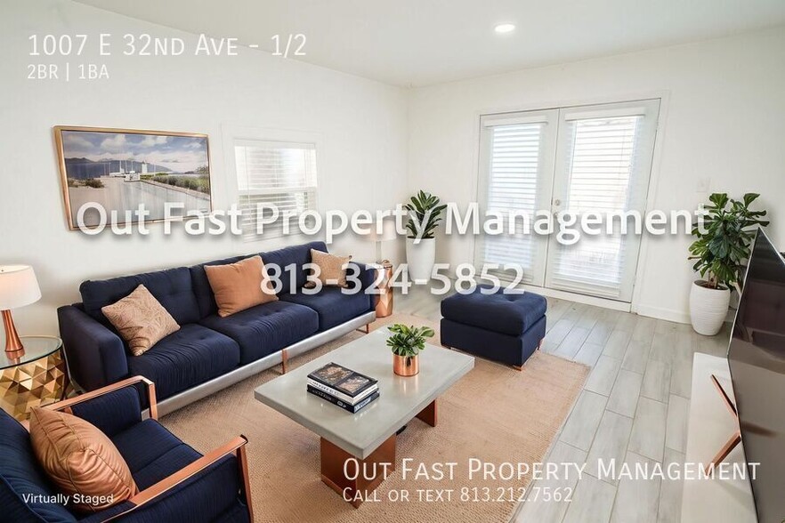 Building Photo - 1007 E 32nd Ave