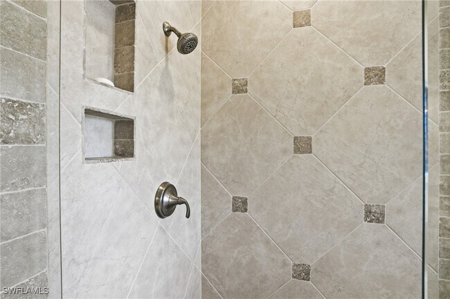 Building Photo - 7048 Pelican Bay Blvd