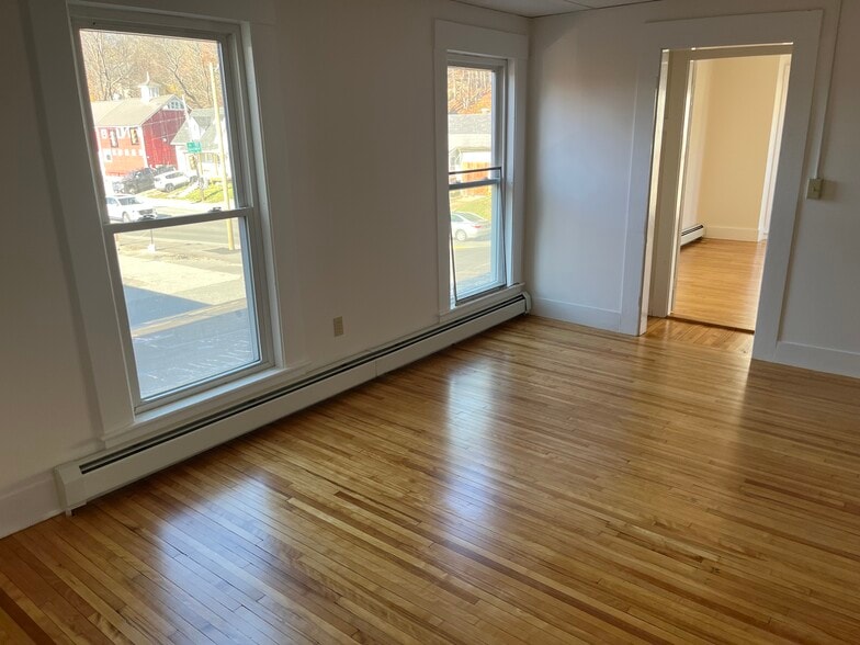 Nice size living room with hardwood floor - 281 Main St