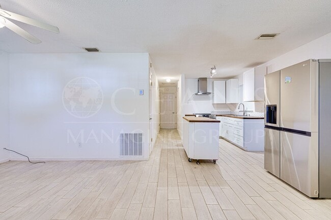 Building Photo - Say Goodbye to Electric Bills & Hurricane Outages with a Solar-Powered Home