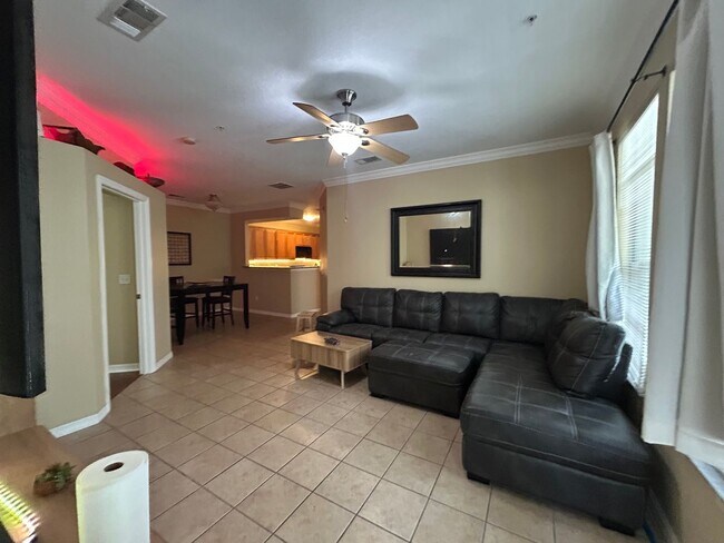 Building Photo - Walk to UF! Spacious & Furnished 3BD Condo...