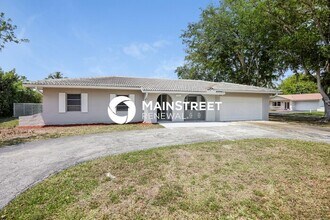 Building Photo - 4 Bedroom Pet-Friendly Home in Coral Springs, FL with Main Street Renewal
