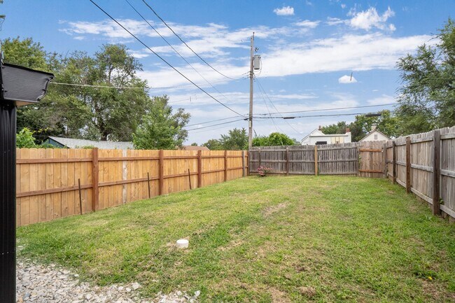 Building Photo - $1795 - Single Family Home with Private Two-Level Living Spaces, Driveway Parking & Modern Updates
