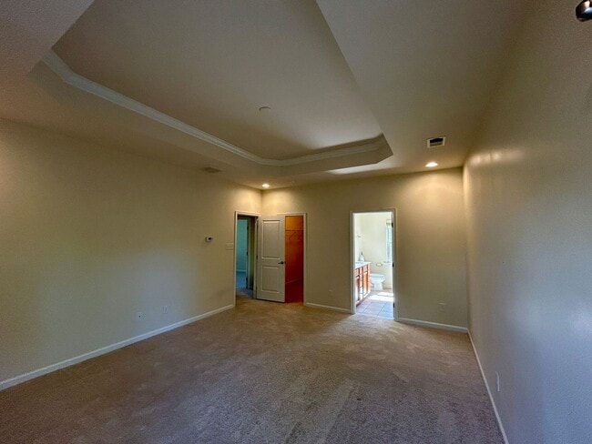 Building Photo - Captivating Craftsman style residence, nestled in the serene Wynwood Section of Fox Creek Subdivi...