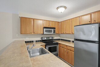 Building Photo - Charming Ground-Floor Condo in the Heart of Greenwood! $1,800 only!! August move in!