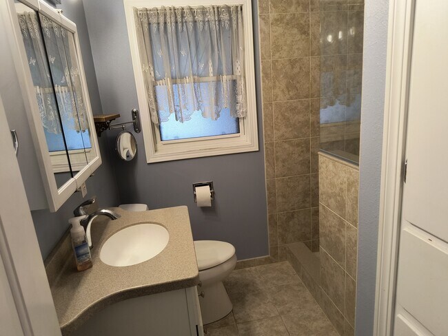 Newly remodeled bathroom with walk in shower. - 2227 23rd St S