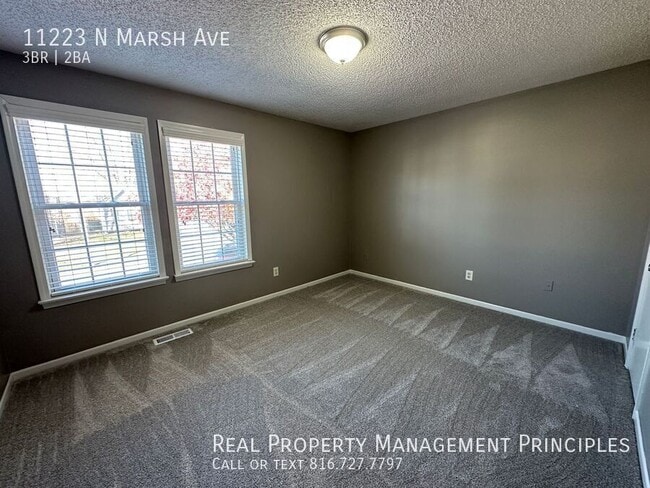 Building Photo - 11223 N Marsh Ave