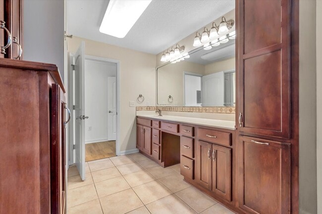 Building Photo - 4BR/3BA Updated Home – Quiet Cove + Fenced Yard!