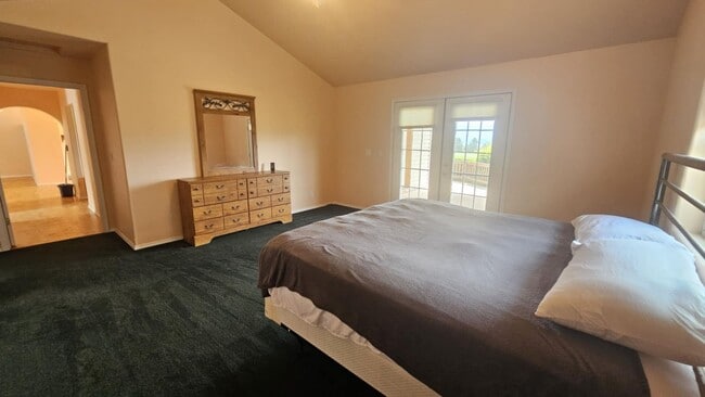 Building Photo - Out of town house with double garage and l...