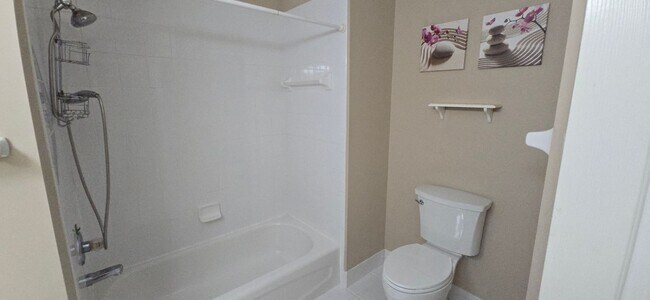 Building Photo - Move-In Ready 2BR/2BA Home with Solar & Bo...