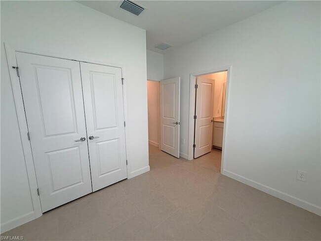 Building Photo - 3917 Passion Vine Dr
