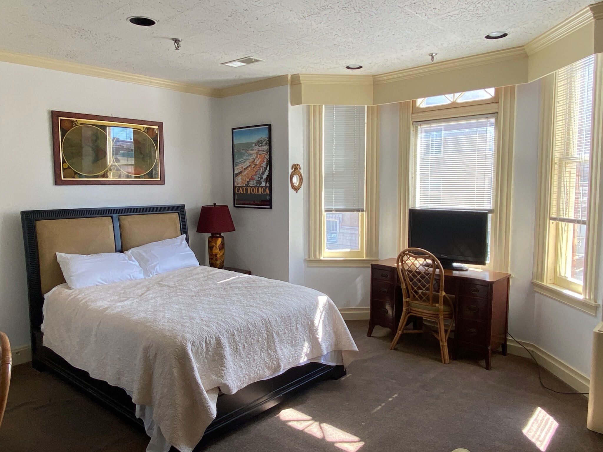 Bed and Desk Area with TV - 940 4th Ave