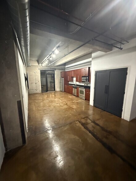 Kitchen and double doors to washer and dryer - 360 W Pershing Rd