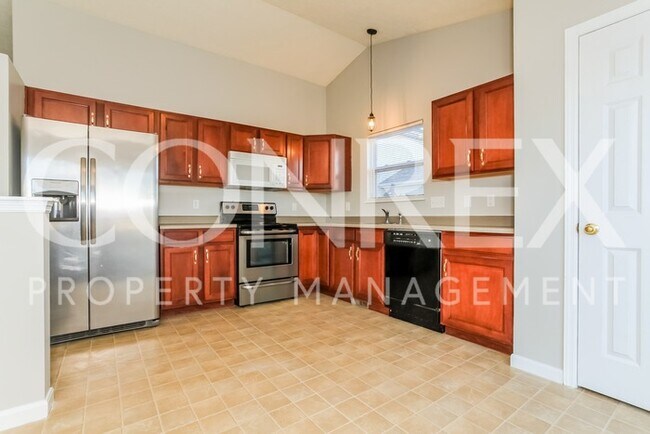 Building Photo - Stunning 3 Bedroom with Cathedral Ceilings!