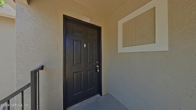 Building Photo - 1701 The Greens Way