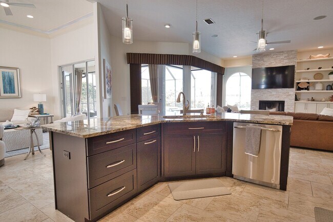 Building Photo - Luxury Home with Saltwater Heated Pool, Spa & Spectacular Golf Course Views, and includes Social ...