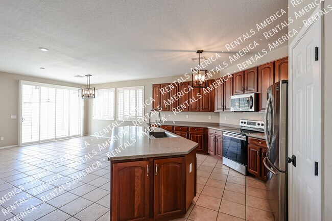 Building Photo - 14977 W Charter Oak Rd