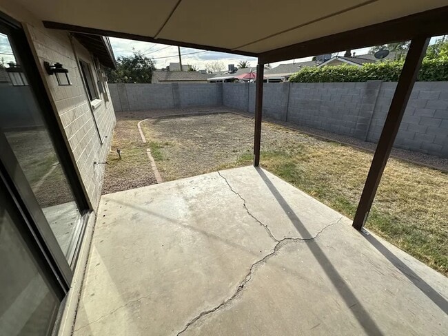 Building Photo - 8718 E Plaza Ave