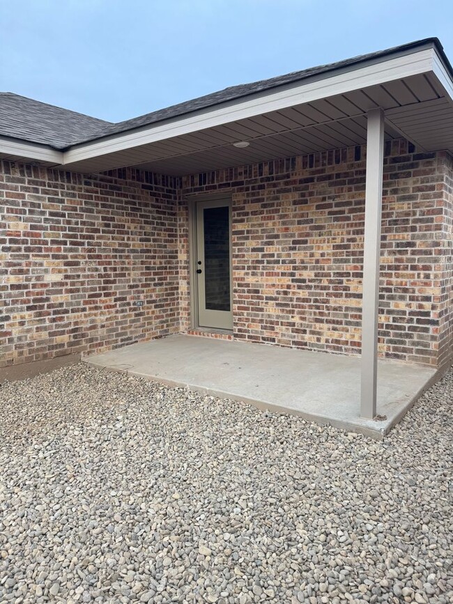 Building Photo - Brand New Construction 3/2/2  1/2 off spec...