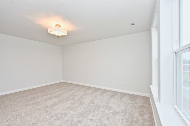 Building Photo - **BE THE LUCKY ONE TO LIVE IN THIS 2024-BUILT TOWNHOME**