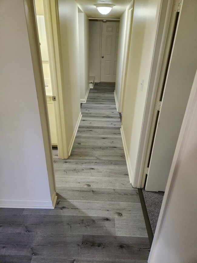 Building Photo - Affordable Apartment Outside the City Limits