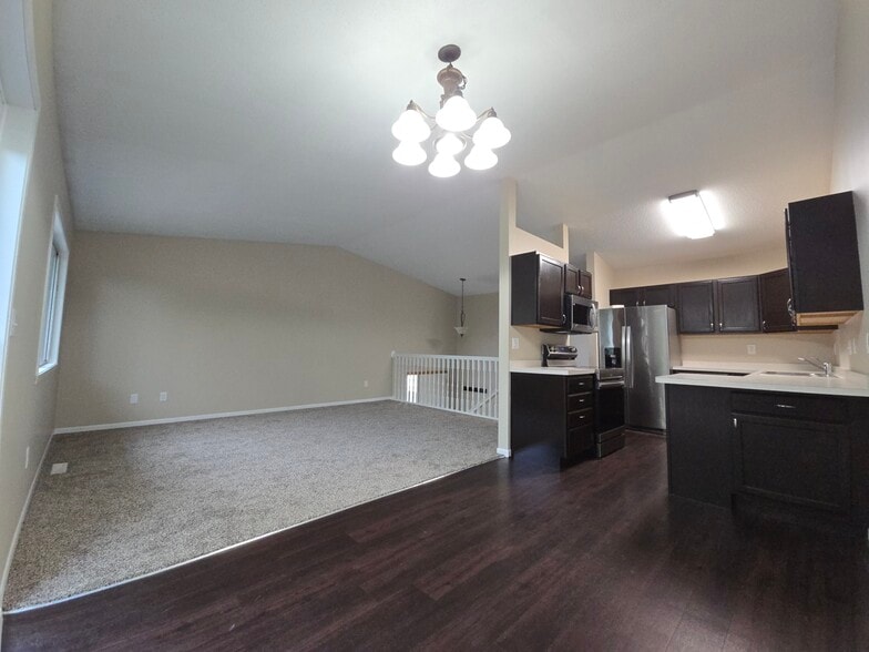 Upper level open floor plan - 994 38 1/2 Ave W