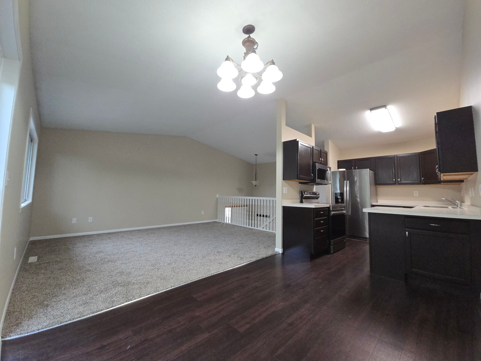 Upper level open floor plan - 994 38 1/2 Ave W