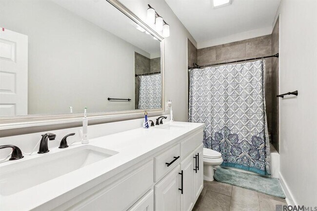 Building Photo - Exquisite 5-Bedroom Home in Denham Springs with Premium Features